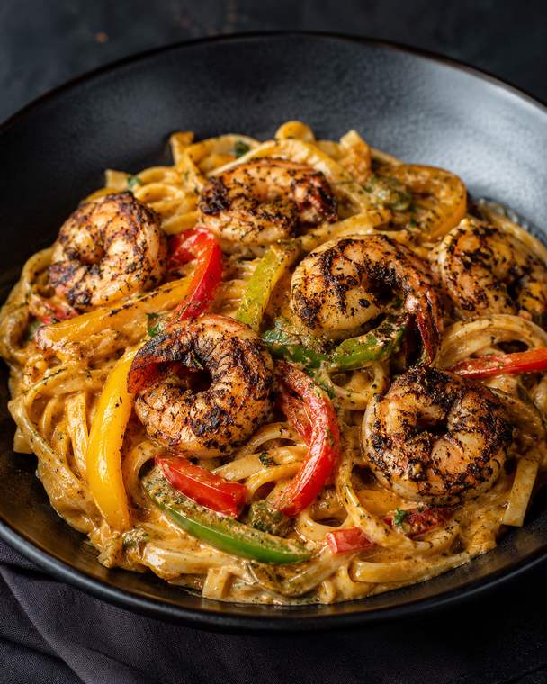 Illustrative jerk shrimp rasta pasta